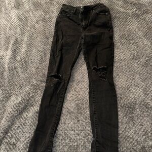 721 Levi’s Black Distressed Skinny Jeans